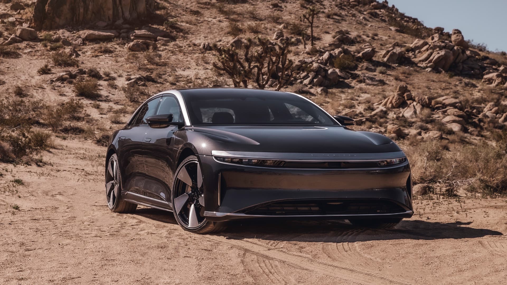 EV maker Lucid debuts its latest Tesla rival, a high-performance luxury sedan with a 446-mile range