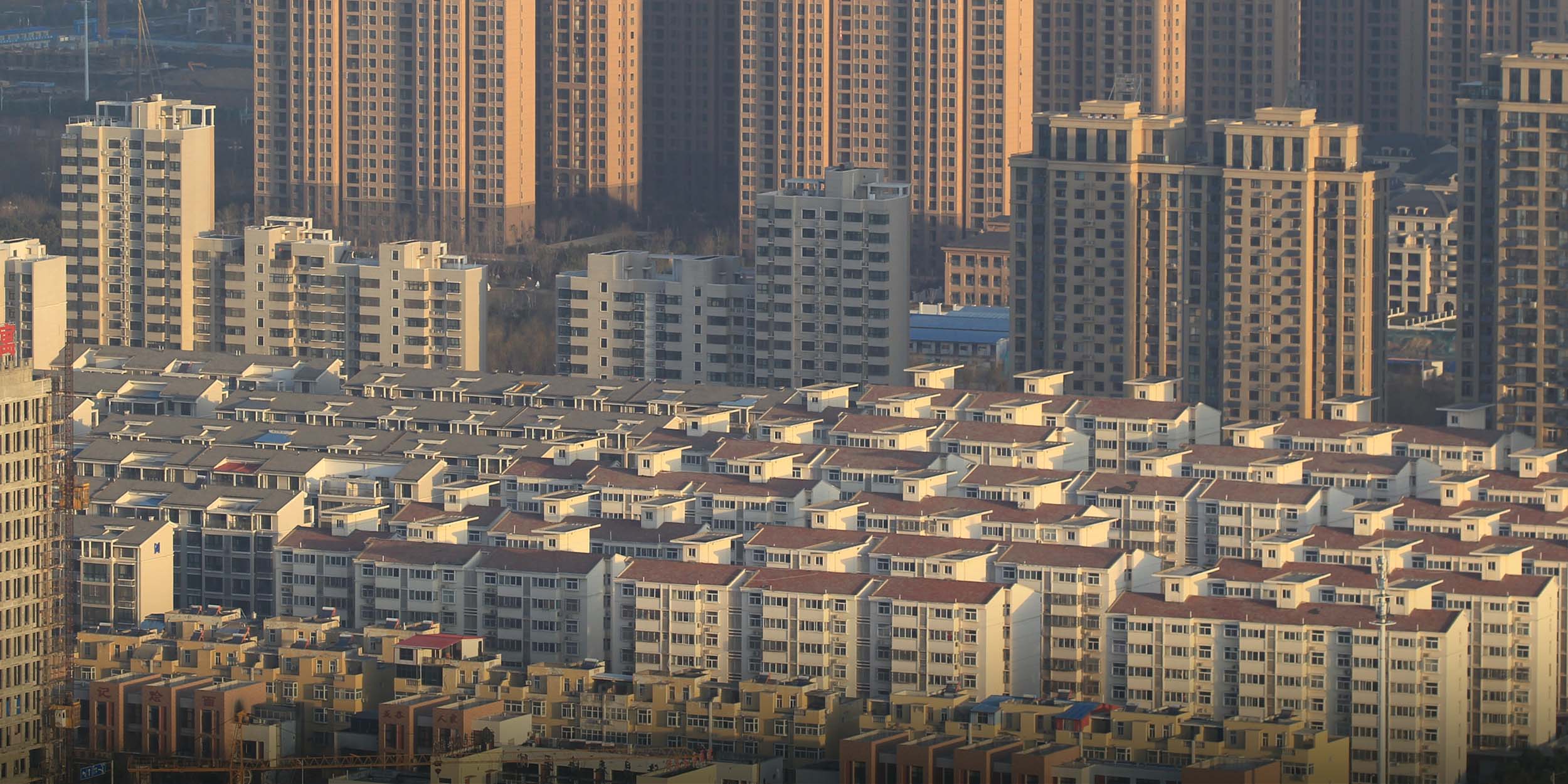 China Unveils Real Estate Data System, Opens Door to Property Tax