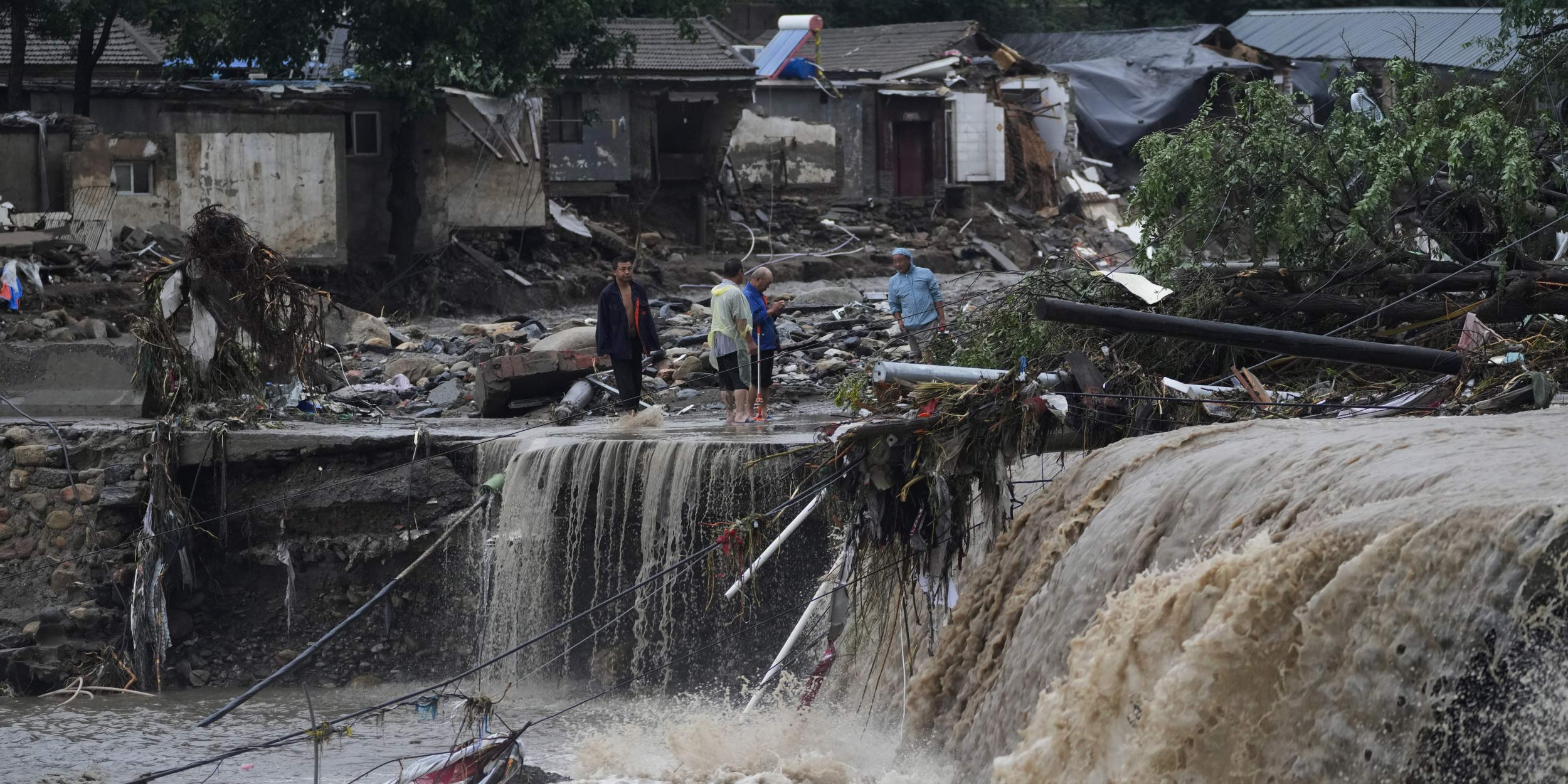 Extreme Floods Hit Beijing, 11 Dead, Residents Cut Off