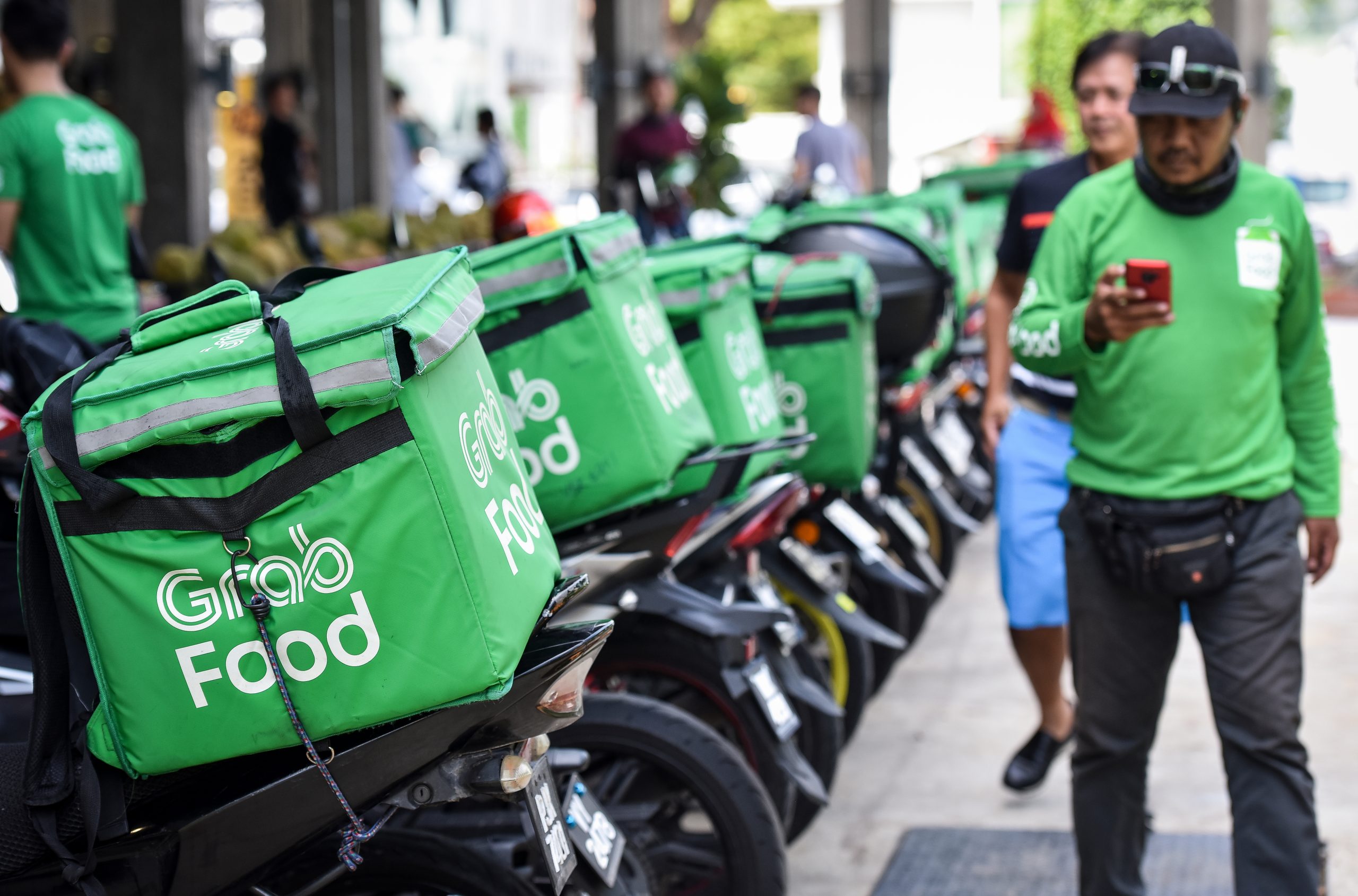 Grab logs standout quarter as deliveries growth rebounds, touts revenue potential of ads