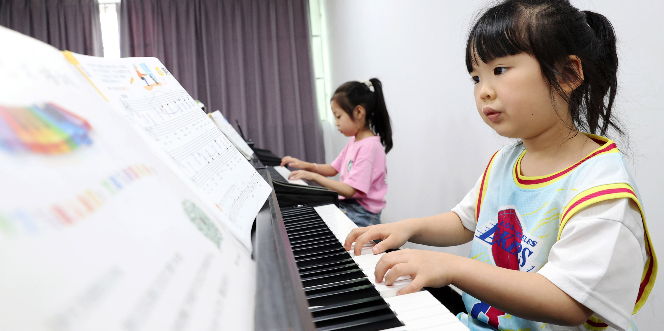 Out of Key: Why China is Stepping Back From Piano Lessons