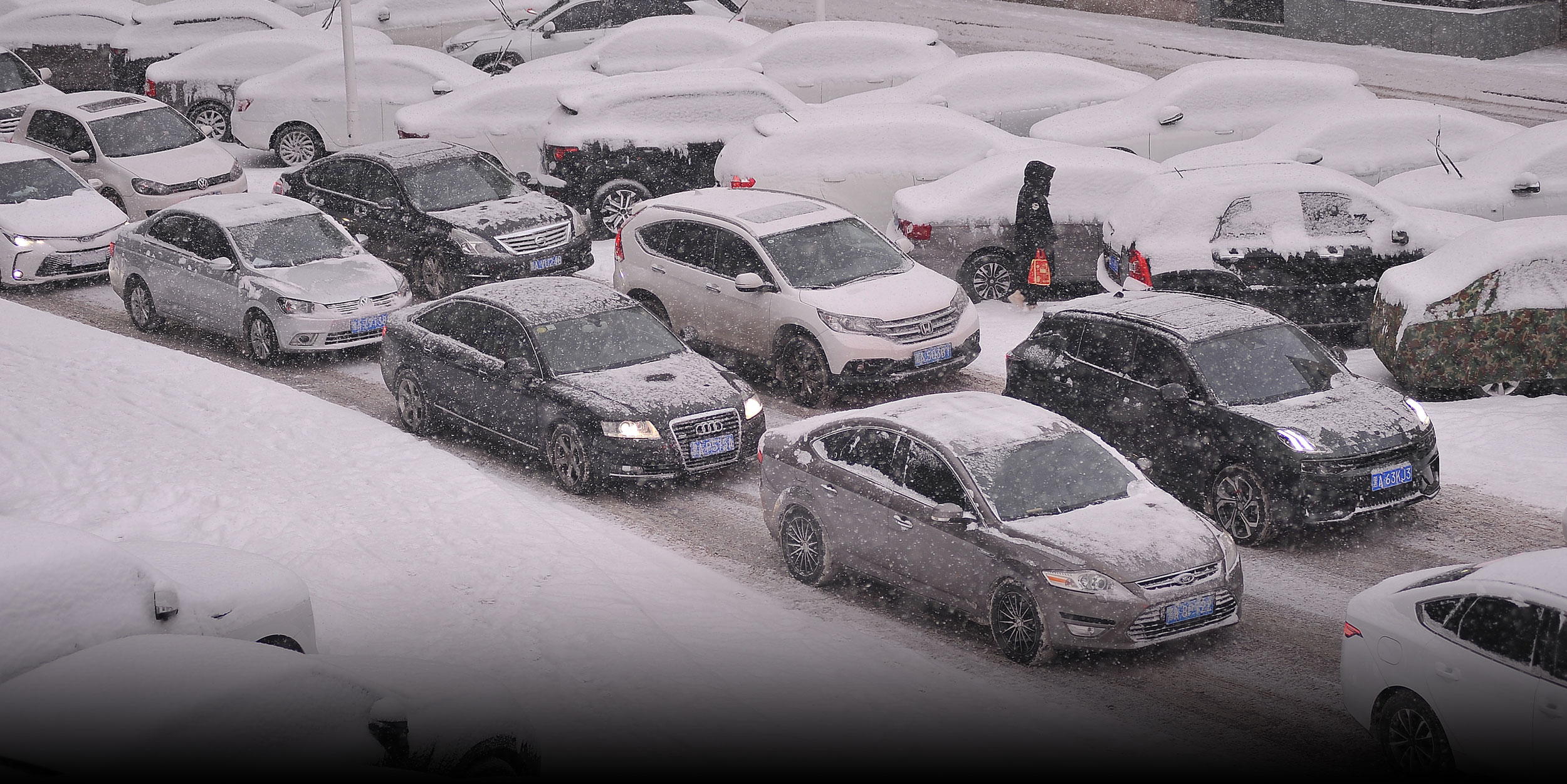 Historic Blizzard Blocks Roads, Buries Cars in Northeast China